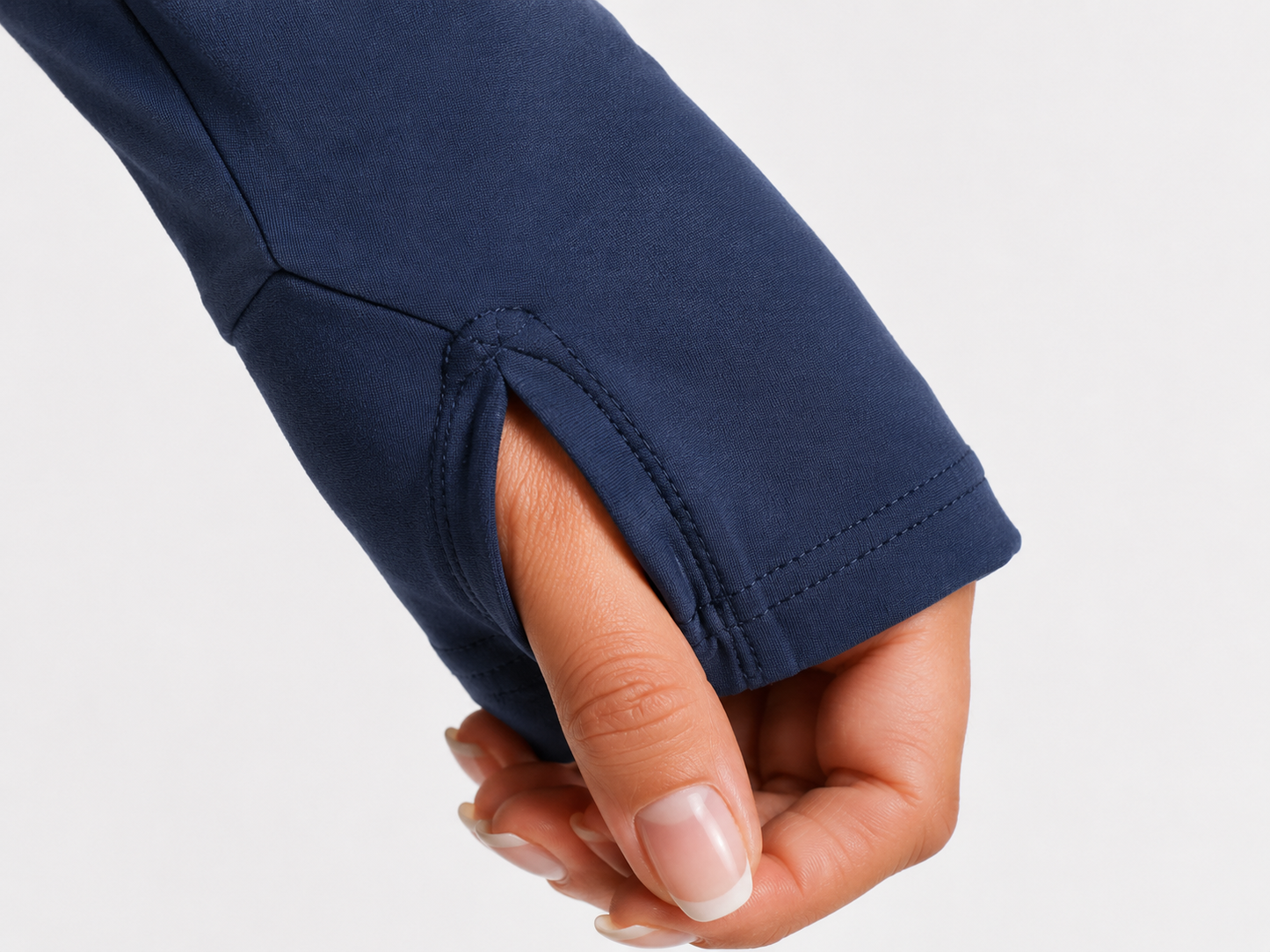 Fierce Ember™ Elevate women’s gym jacket in Steel Blue with close-up thumb-hole cuff, stretch fabric and reinforced seam detail.