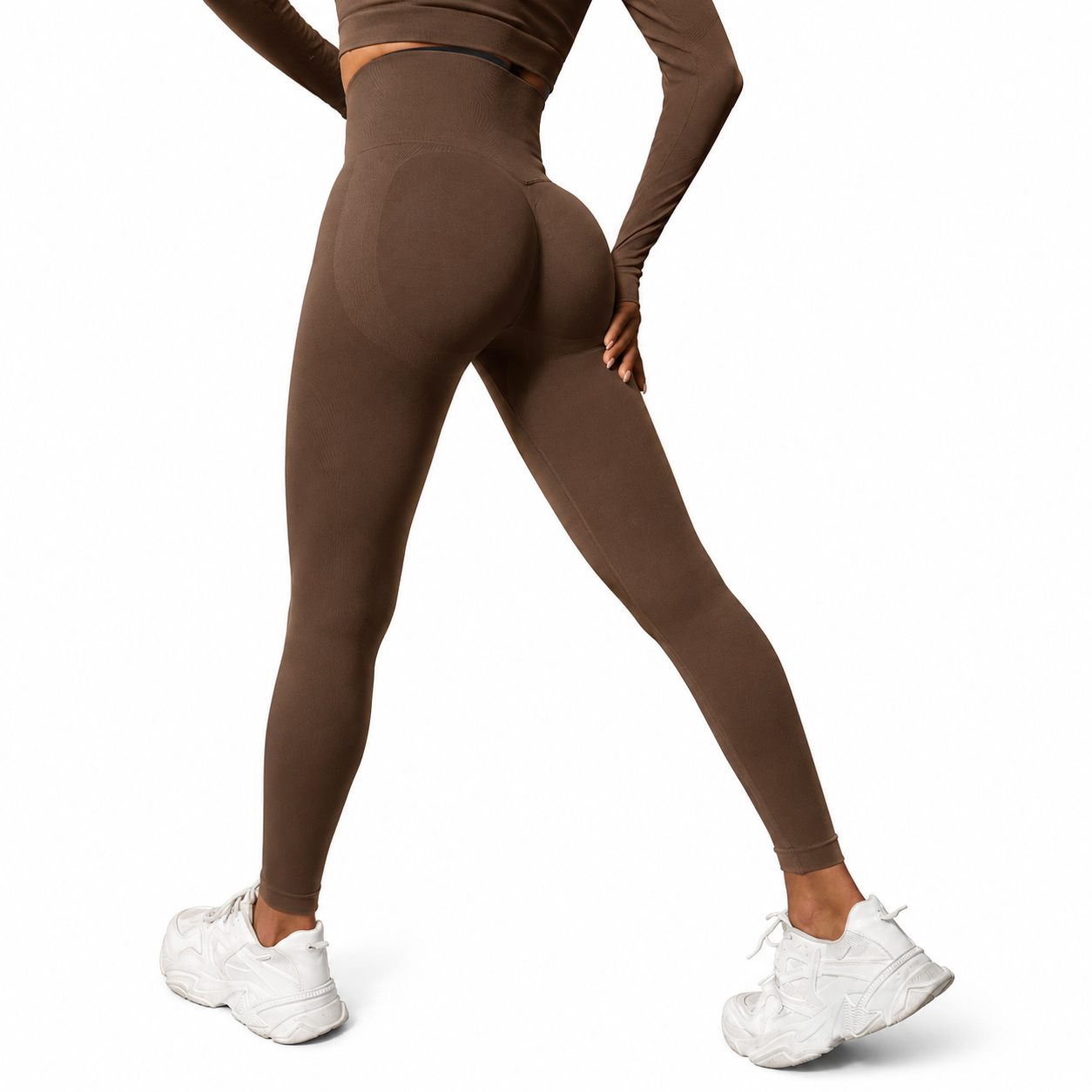 Close-up rear view of Fierce Ember Signature Leggings in cocoa, showcasing the seamless sculpting design, high-waisted fit and contour-enhancing performance fabric.