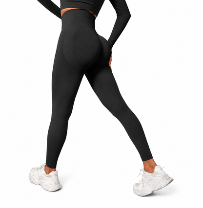 Close-up rear view of Fierce Ember Signature Leggings in midnight black, showcasing the seamless sculpting design, high-waisted fit and contour-enhancing performance fabric.