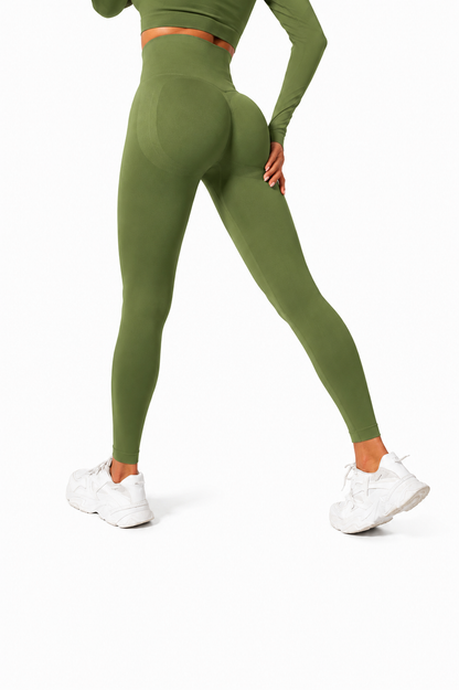Close-up rear view of Fierce Ember Signature Leggings in olive, showcasing the seamless sculpting design, high-waisted fit and contour-enhancing performance fabric.