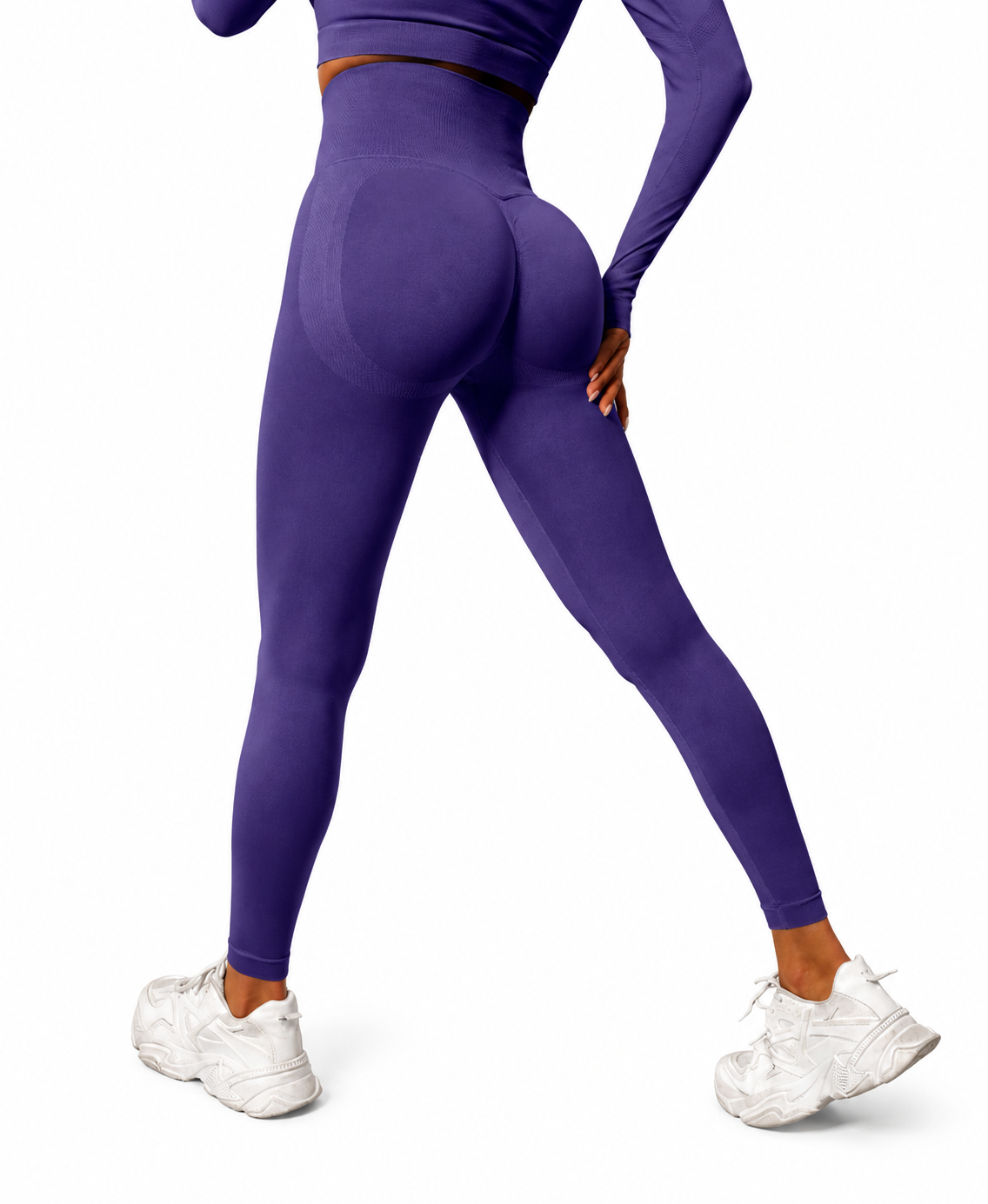 Close-up rear view of Fierce Ember Signature Leggings in purple rain, showcasing the seamless sculpting design, high-waisted fit and contour-enhancing performance fabric.