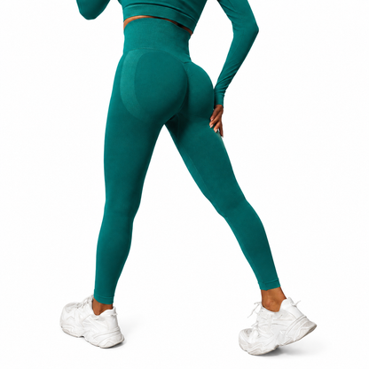 Close-up rear view of Fierce Ember Signature Leggings in racing green, showcasing the seamless sculpting design, high-waisted fit and contour-enhancing performance fabric.