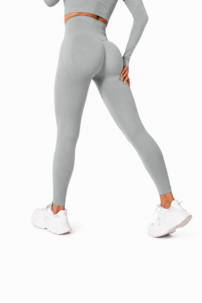 Close-up rear view of Fierce Ember Signature Leggings in shark grey, showcasing the seamless sculpting design, high-waisted fit and contour-enhancing performance fabric.