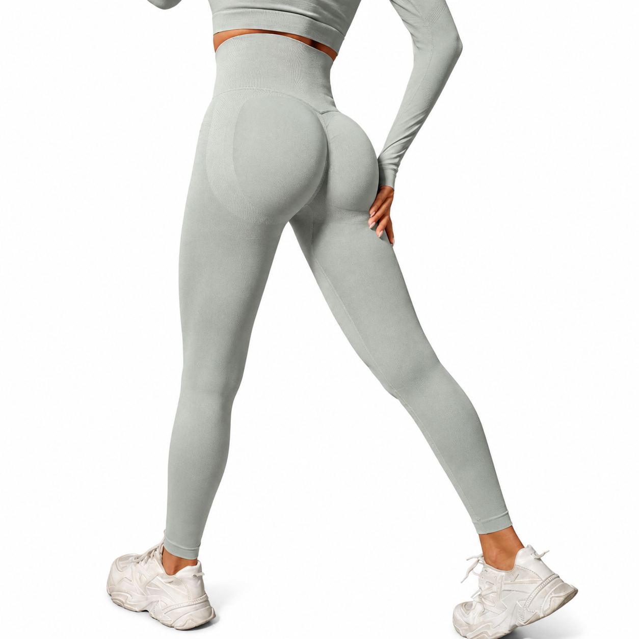 Close-up rear view of Fierce Ember Signature Leggings in silver grey, showcasing the seamless sculpting design, high-waisted fit and contour-enhancing performance fabric.