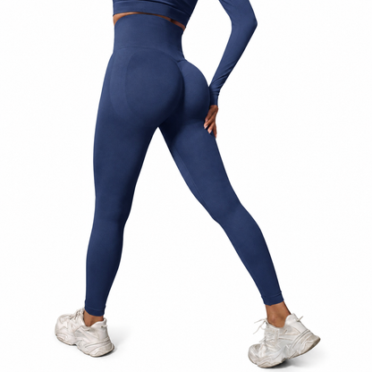 Close-up rear view of Fierce Ember Signature Leggings in storm blue, showcasing the seamless sculpting design, high-waisted fit and contour-enhancing performance fabric.