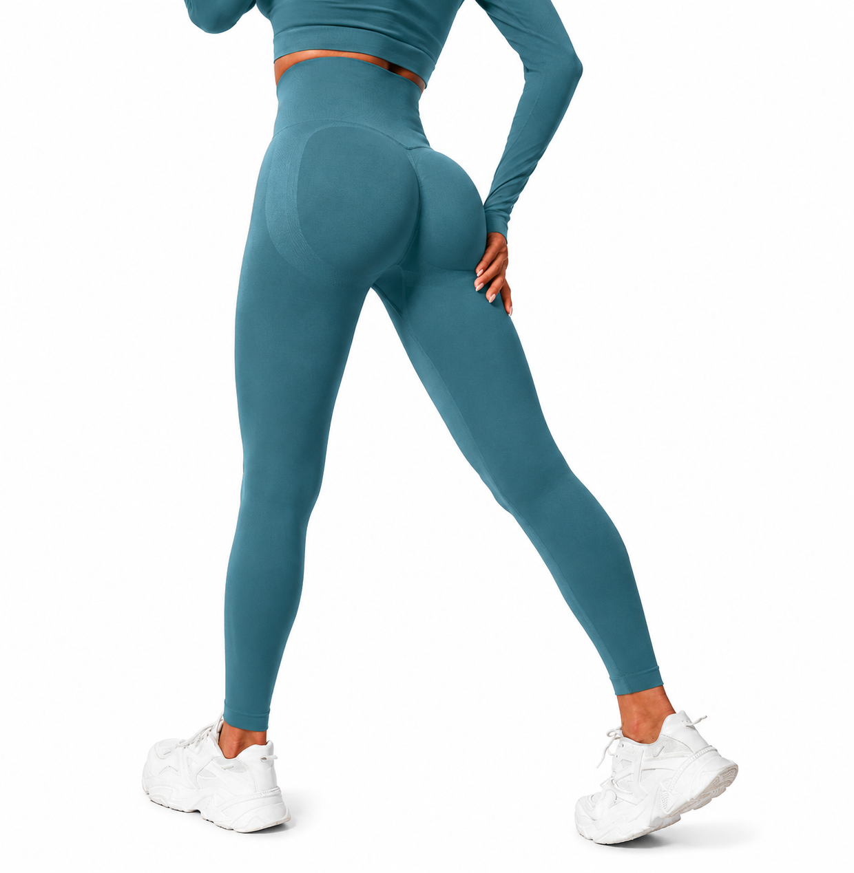Close-up rear view of Fierce Ember Signature Leggings in teal showcasing the seamless sculpting design, high-waisted fit and contour-enhancing performance fabric.