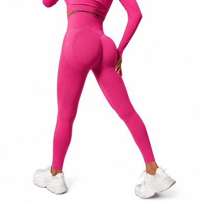 Close-up rear view of Fierce Ember Signature Leggings in vibrant pink, showcasing the seamless sculpting design, high-waisted fit and contour-enhancing performance fabric.