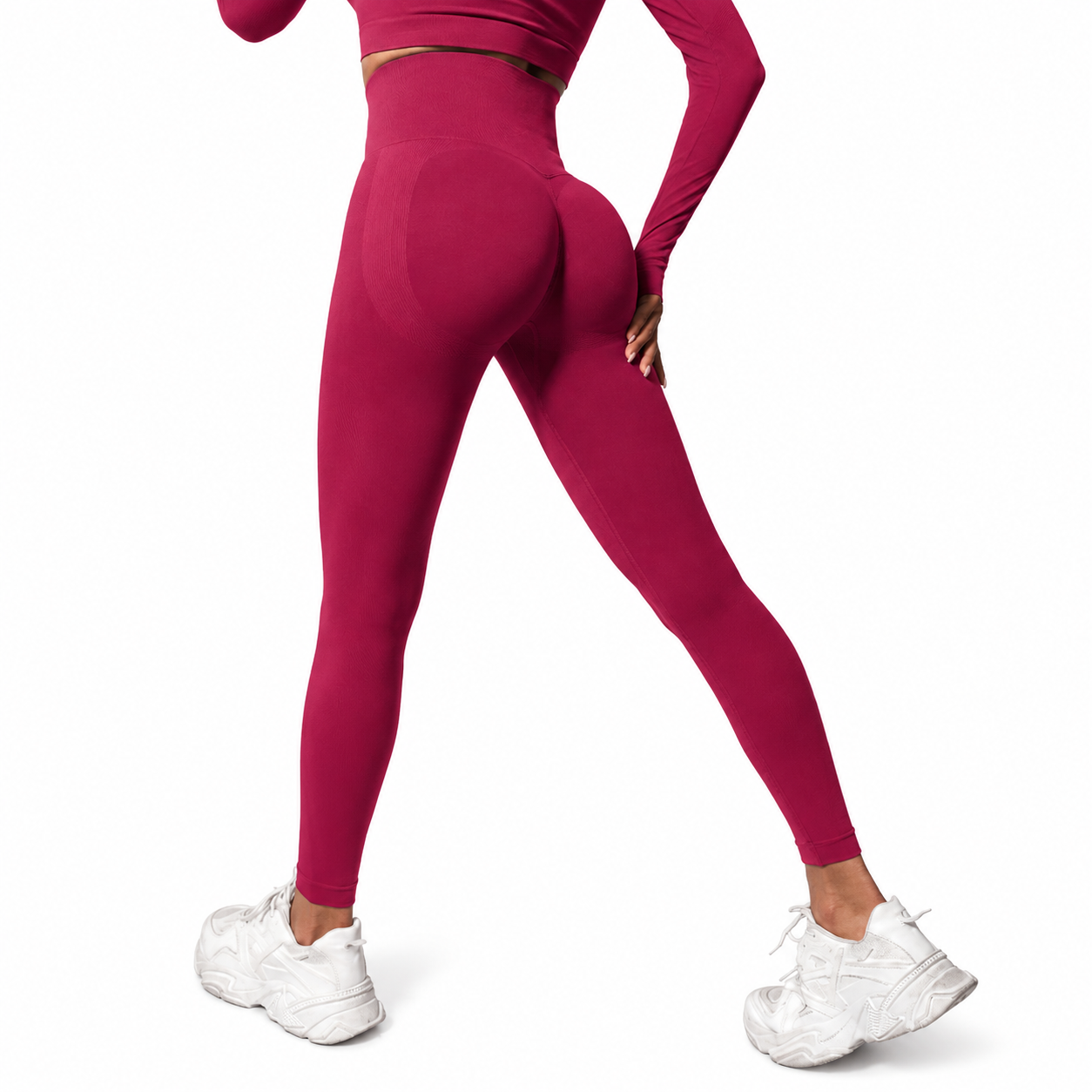 Close-up rear view of Fierce Ember Signature Leggings in wine red, showcasing the seamless sculpting design, high-waisted fit and contour-enhancing performance fabric.