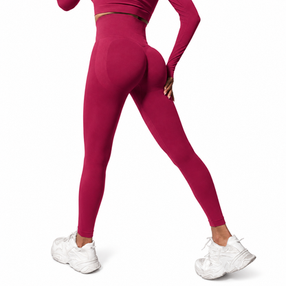 Close-up rear view of Fierce Ember Signature Leggings in wine red, showcasing the seamless sculpting design, high-waisted fit and contour-enhancing performance fabric.
