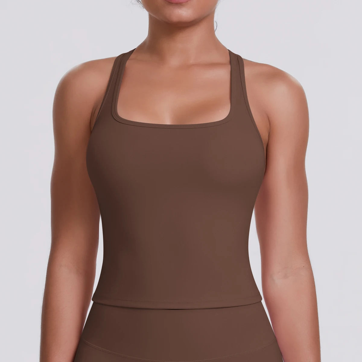 Close-up front view of the Fierce Ember Define™ Square Neck Tank in Espresso Brown, highlighting the square neckline, sculpting fit and premium women's activewear design for gym, yoga, Pilates and everyday movement.