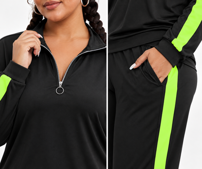 A black athletic tracksuit set featuring a half-zip long-sleeve top and matching pants, both accented with bright neon green side stripes. The image is a split-screen close-up showing the model's upper body and hand in the pocket.