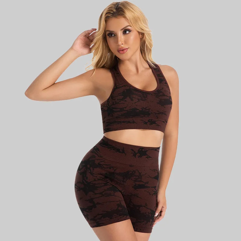 Woman wearing the Mind Body and Soles Power Vibe Energy seamless sports bra and high-waisted shorts set in Dark Brown