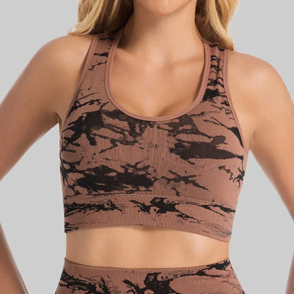 Woman wearing the Mind Body and Soles Power Vibe Energy seamless sports bra and high-waisted shorts set in  Brown.