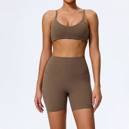 Mind Body and Soles Power Vibe Ignite Set in coffee, premium women's two-piece activewear featuring a supportive sports bra and high-waisted bike shorts. Studio product image showcasing a sculpting fit, buttery-soft performance fabric, high-waisted support, four-way stretch, moisture-wicking comfort and squat-proof confidence for gym workouts, strength training, Pilates, yoga and everyday active living.